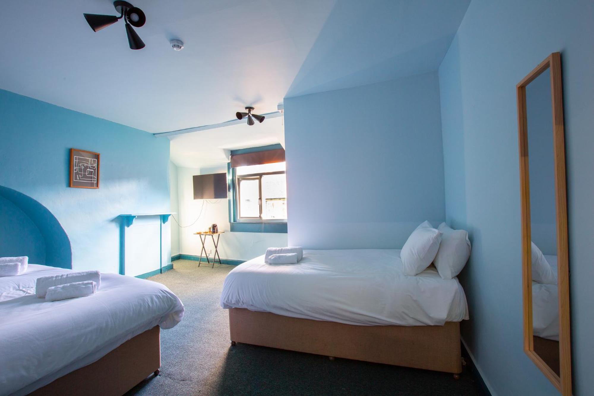 Chambre Quadruple avec Salle de Bains Commune